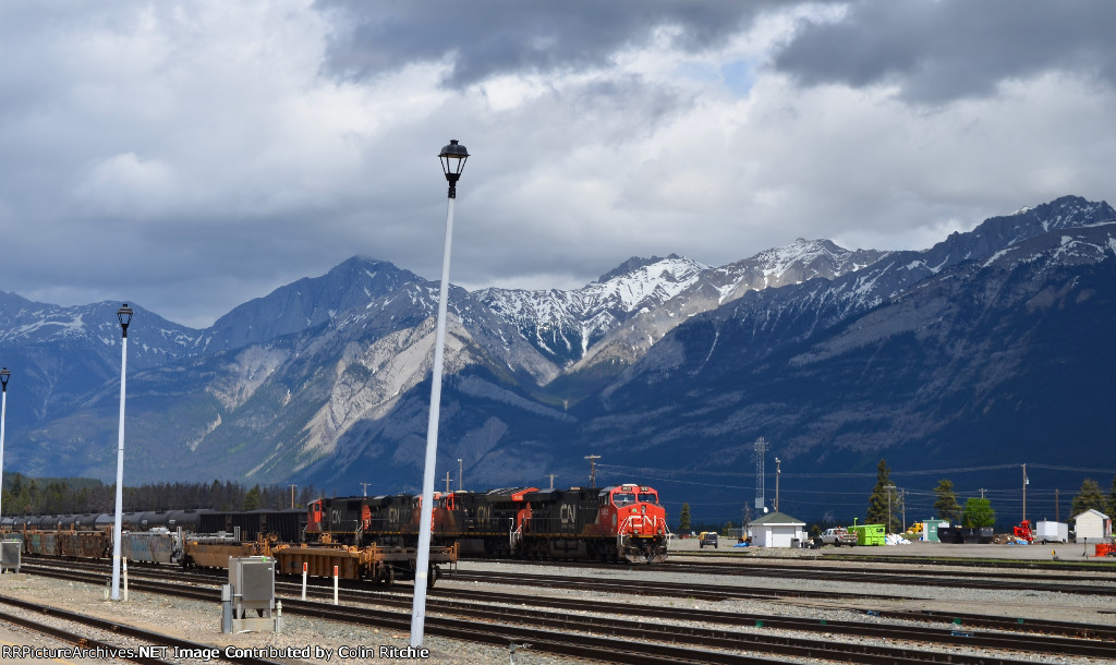 W/B unit tank car train led by CN 3832 and 3 other CN locomotives, waiting for departure